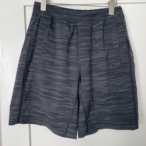 Men’s pace breaker lined running shirts. Size Medium.